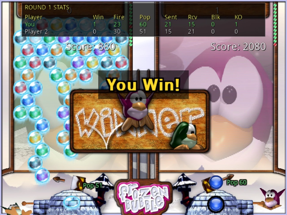 The end of a two-player round: You Win! with the round's stats along the top